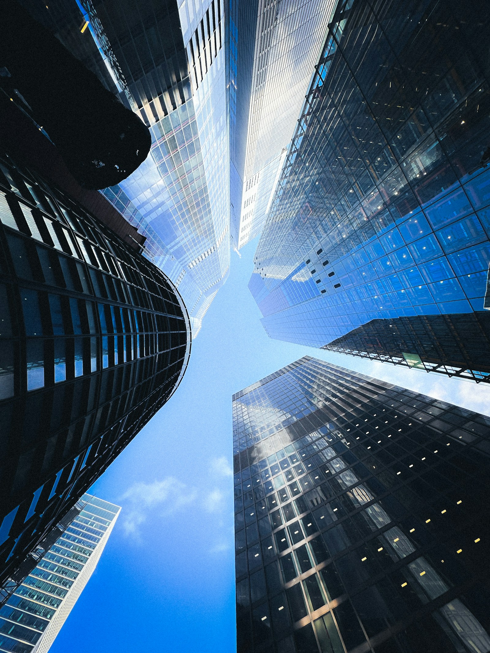 Looking up through modern glass architecture
